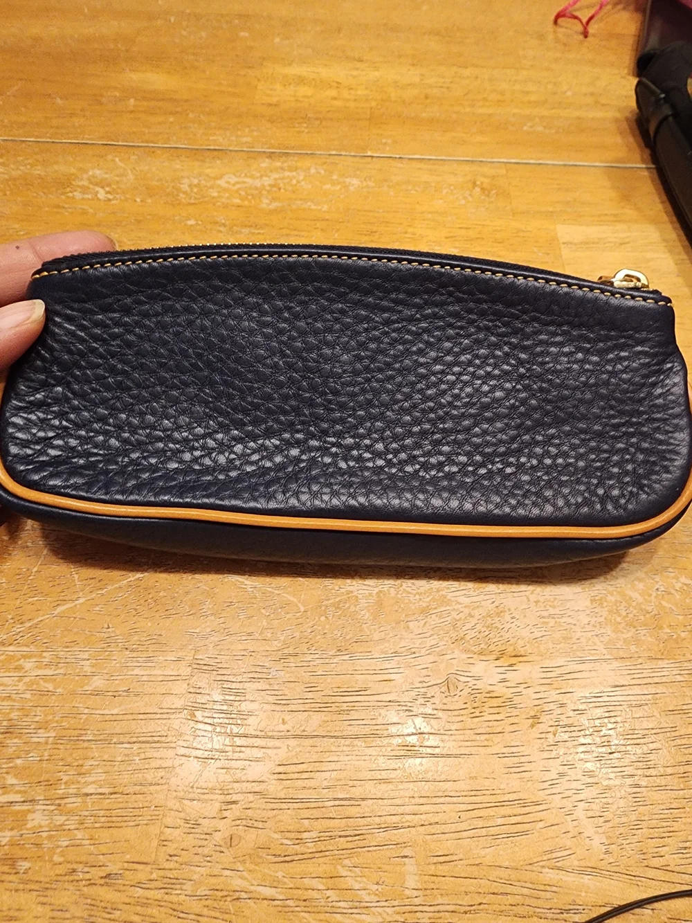 Dooney & Bourke Pebble Grain Slim Cosmetic slim pouch in navy blue Leather